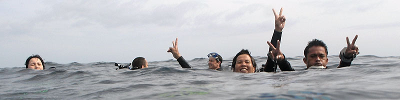 Scuba Divers in The Water